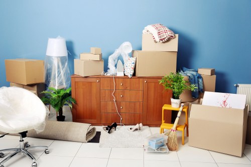 Family settling into a new home after removals in Enfield