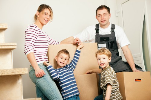 Moving van and packed boxes during a home removal service