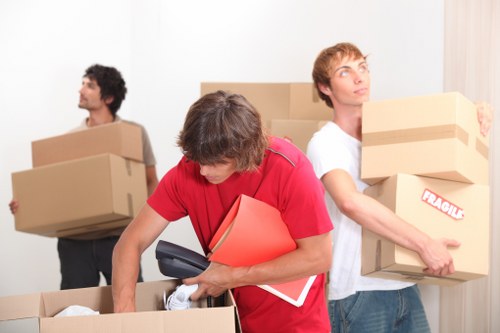 Local furniture pick-up service removing sofas and beds from a home in Enfield