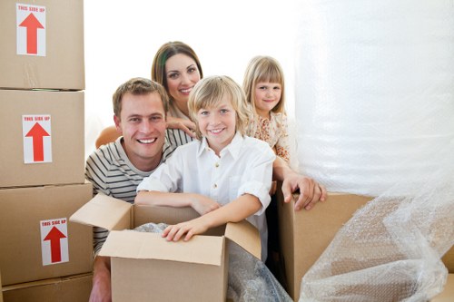 Office relocation team handling equipment during removal services in Enfield