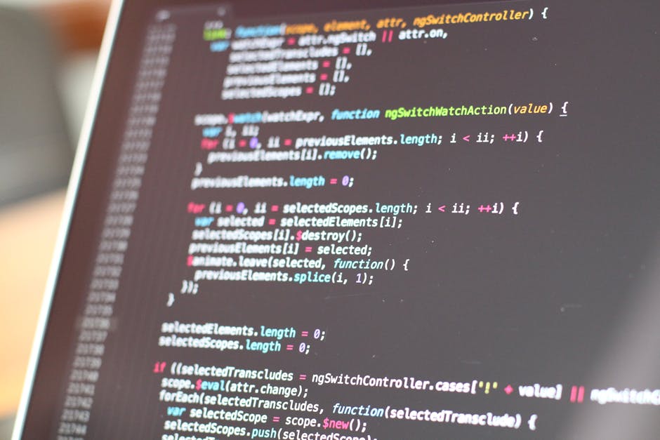 A computer screen displaying a code editor with several lines of programming code in different colours, including green, blue, pink, and white, with a directory structure on the left side showing fold